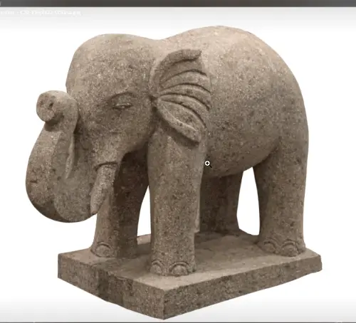 Product image of the product “Standing elephant with base made of basanite stone about 50cm height. ”